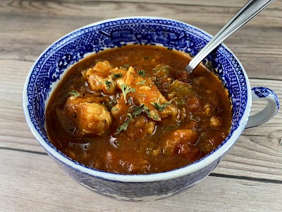 catfish-stew.jpeg->first()->description