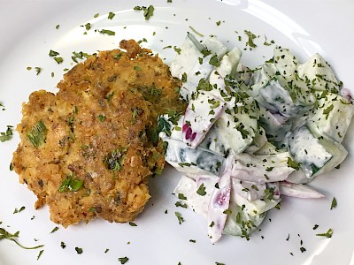 salmon-croquettes-with-creamy-cuke-and-onion-salad.jpeg->first()->description